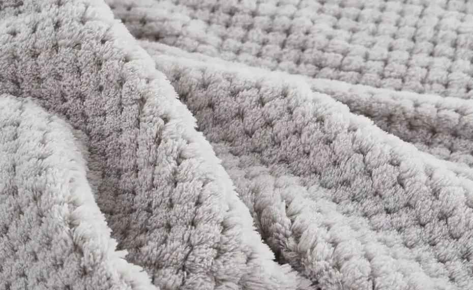 como Coralfleece Decke